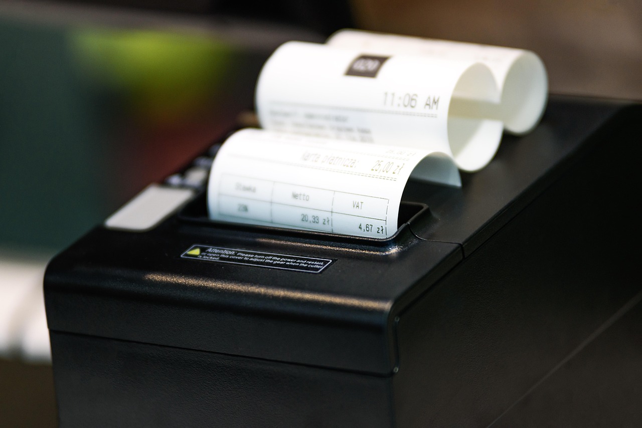 restaurant owner sorting bookkeeping receipts