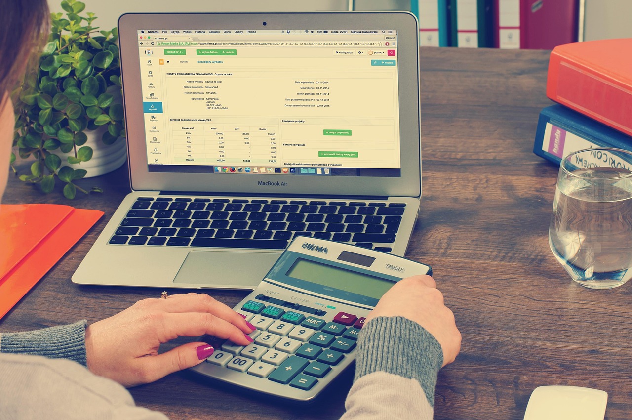 accountant organizing contractor bookkeeping papers